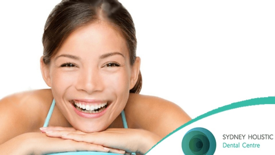 women smiling with healthy teeth