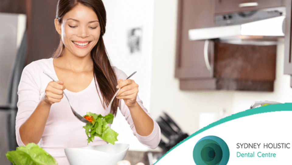 Young woman enjoying healthy salad