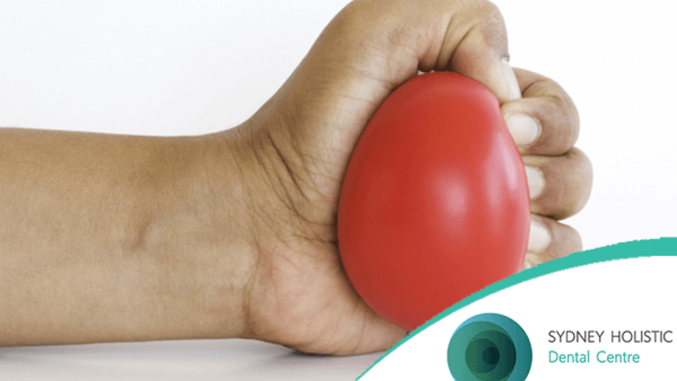 Person squeezing stress ball