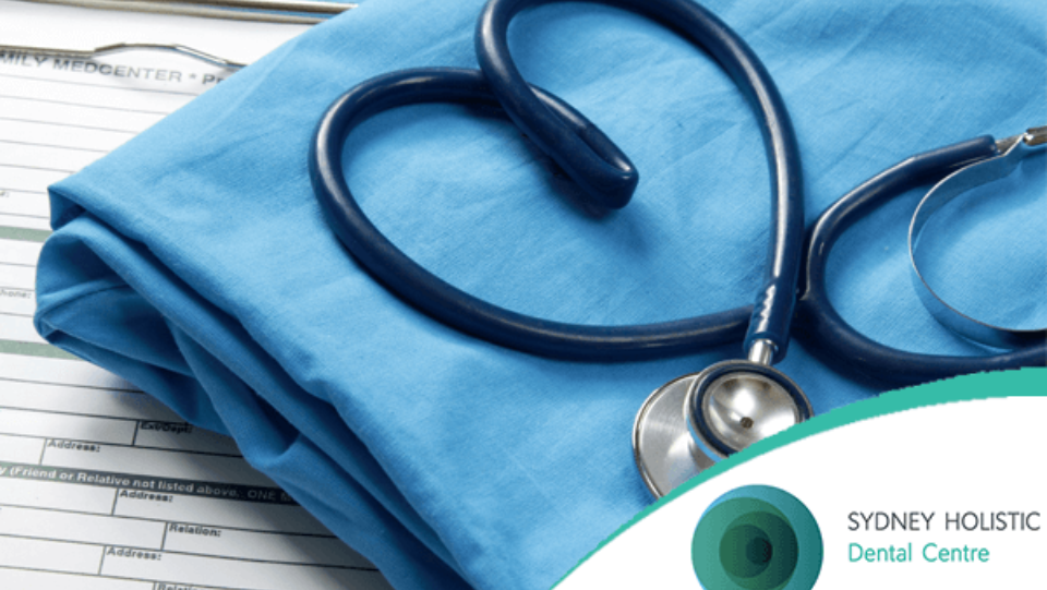 Stethoscope on blue medical scrubs