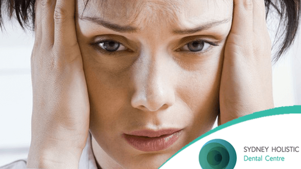 woman experiencing headache